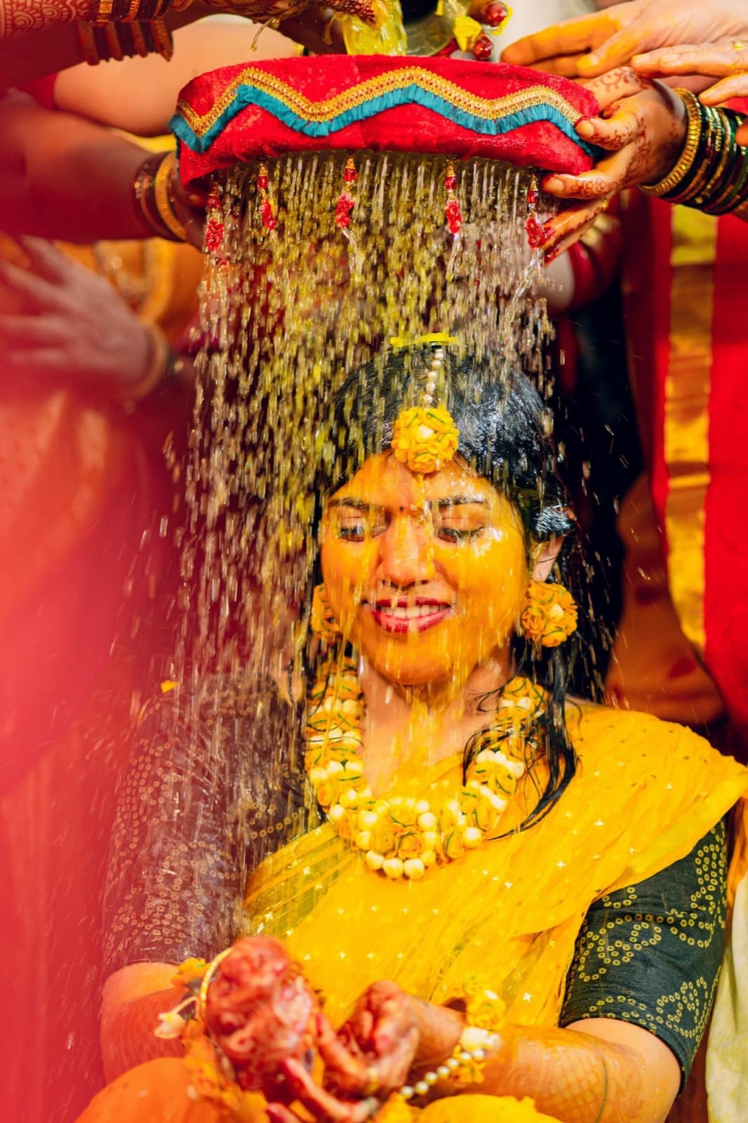 A bride during the haldi turmeric ceremony