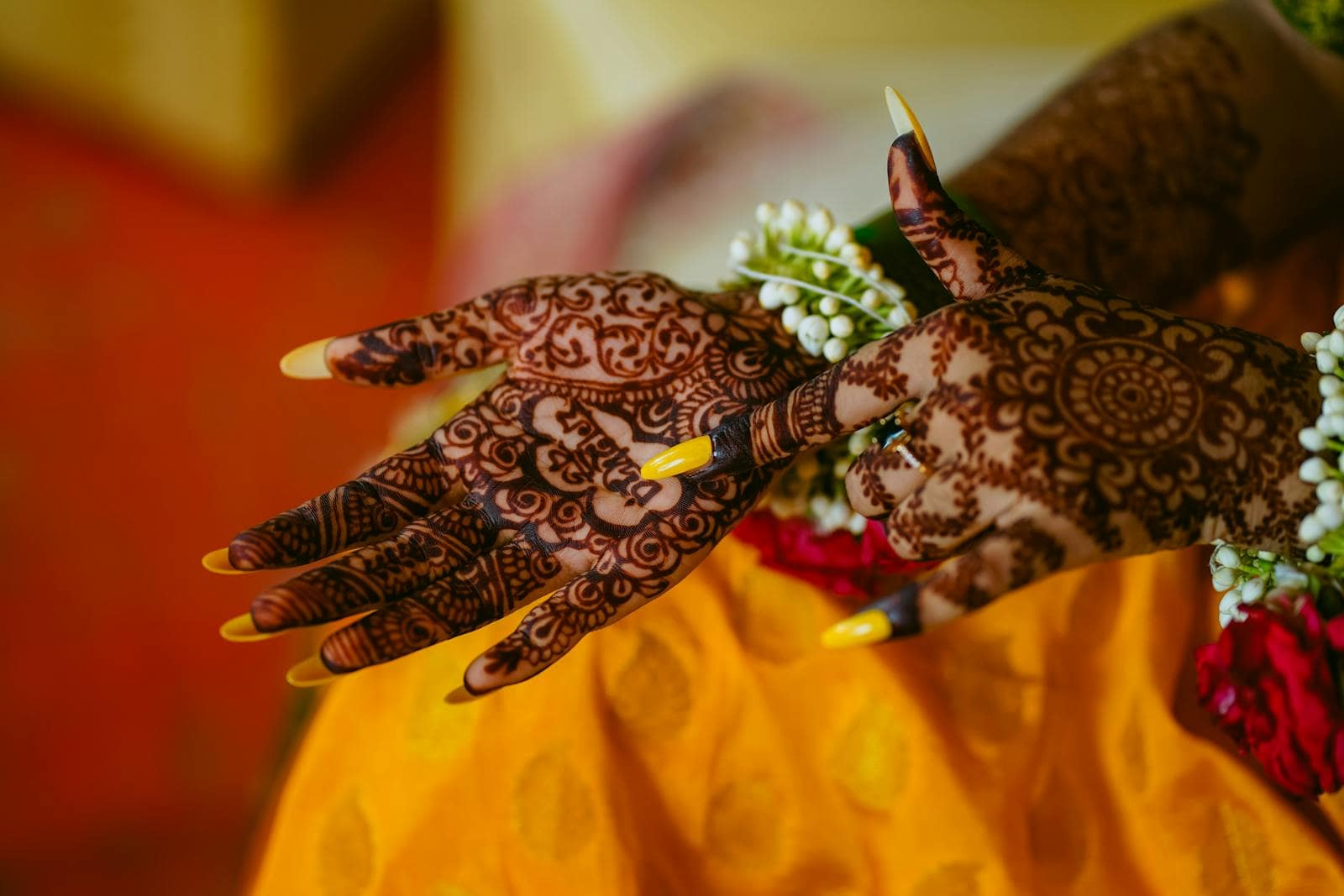Intricate mehndi henna on a bride’s hands
