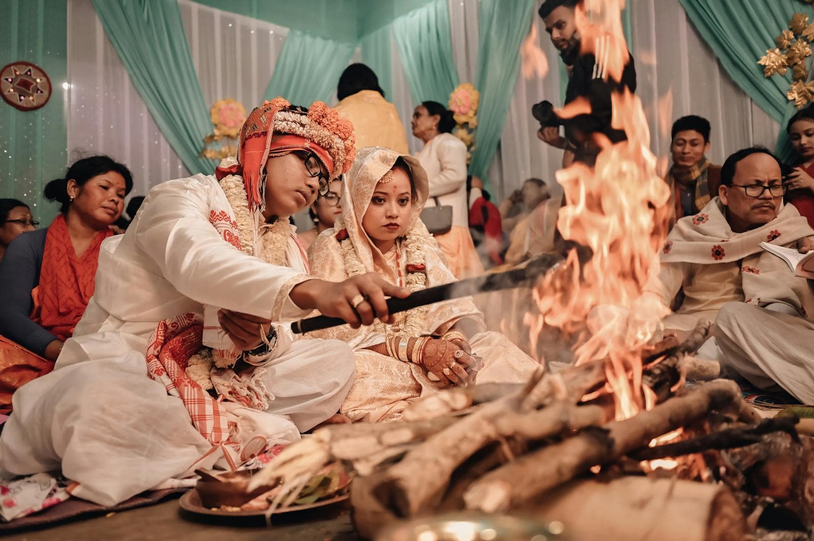 A couple circling the sacred fire during the saptapadi